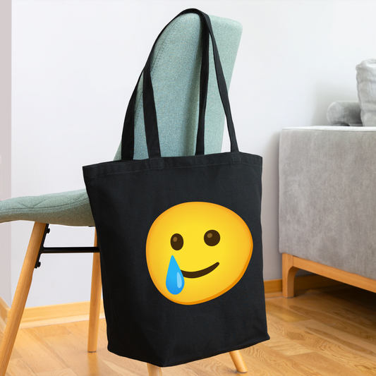 🥲 Smiling Face with Tear (Noto Color Emoji) Eco-Friendly Cotton Tote - black